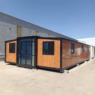 Protección del medio ambiente 2 dormitorios Prefab Casa de contenedores expandible con puerta de acero