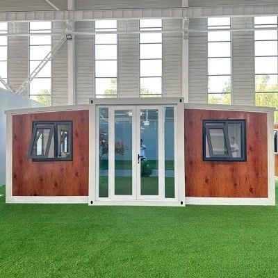 Protección del medio ambiente 2 dormitorios Prefab Casa de contenedores expandible con puerta de acero