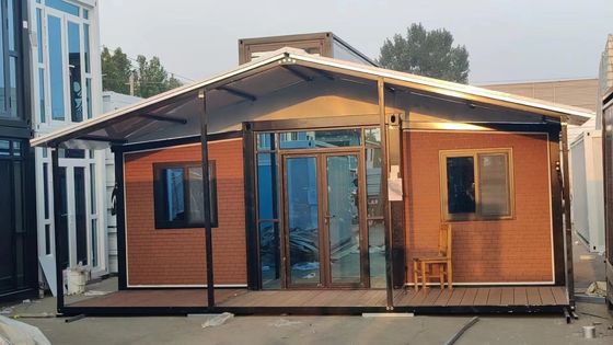 Vivienda multifuncional con casa de contenedores de paquetes de grasa montada