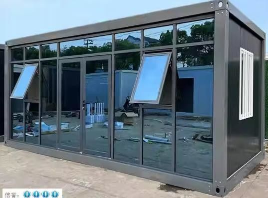 Contenedor de paquete plano Puerta de acero desmontable Oficina móvil Modular Pared de vidrio Hogar pequeño